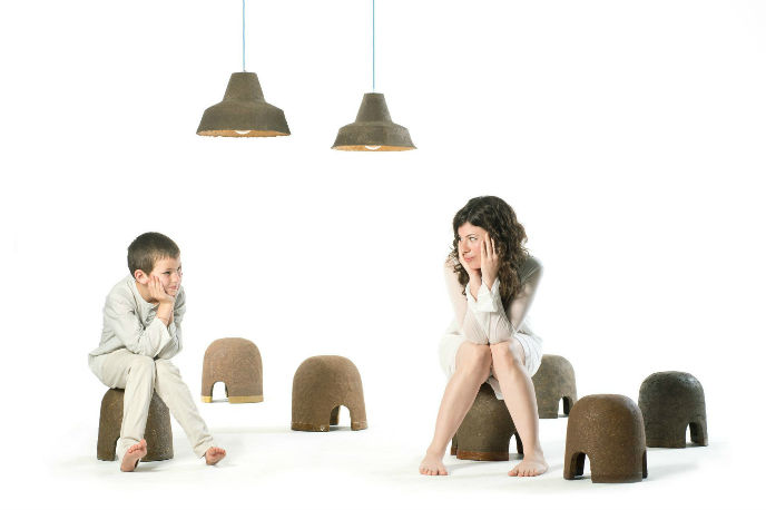 The artist’s friend Maayan and her nephew, Yonatan, sit on Terra stools. Photo by Shay ben Efrayim