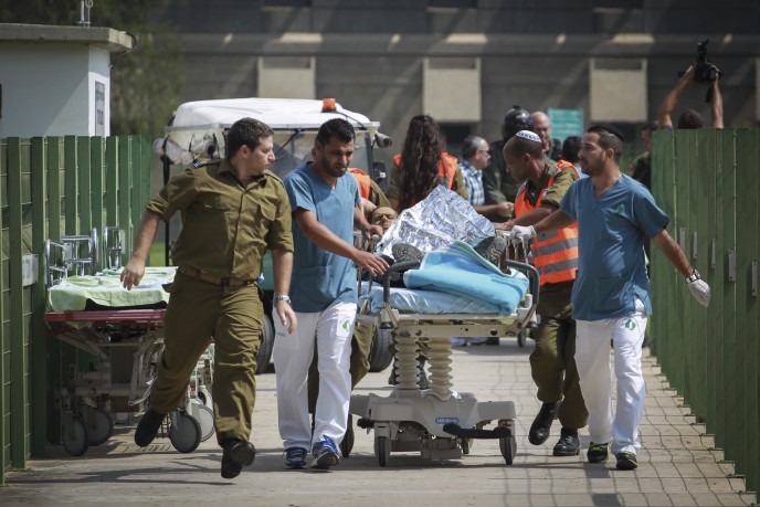 Wounded soldiers arriving at Soroka Medical Center in Beersheva on Tuesday. Photo by Hadas Parush/Flash90