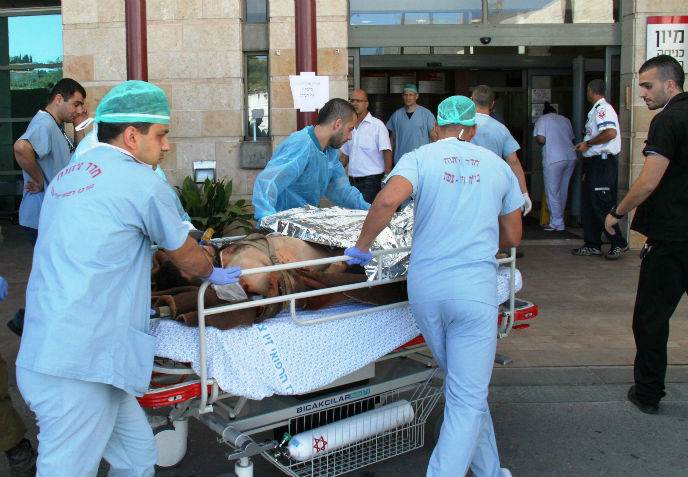 A wounded Syrian is brought to Ziv Medical Center for treatment.