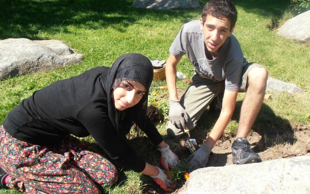 Warde Abuliel from Ein Mahel and Guy Shilo from Leo Baeck gardening together during Friends Forever.