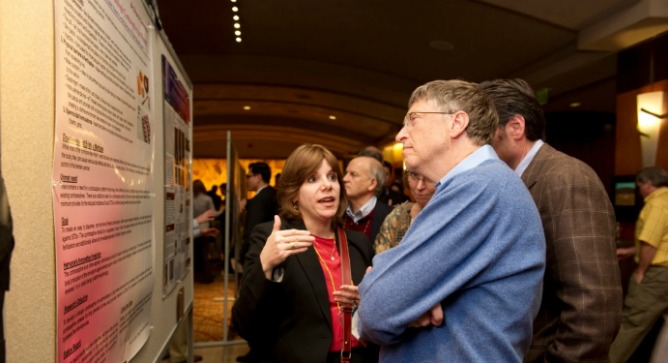 Hervana founder Rachel Teitelbaum explaining her new contraceptive suppository to Bill Gates.