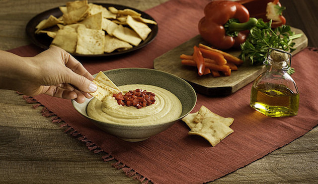  Sabra brand hummus is finding its way to American tables. 