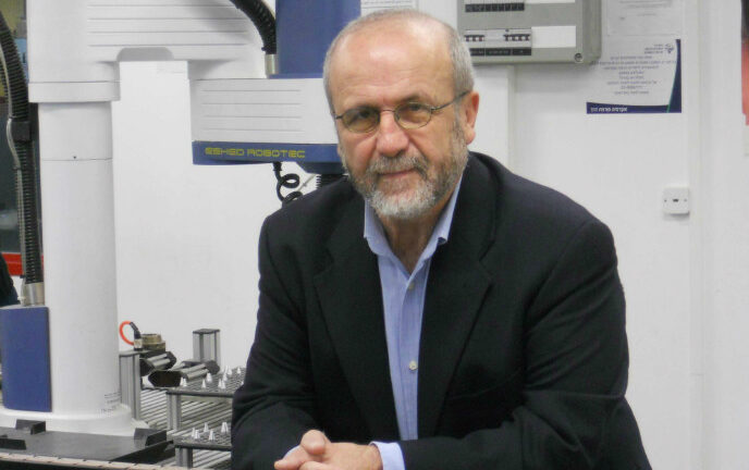 Prof. Zvi Shiller in his robotics lab at Ariel University. 