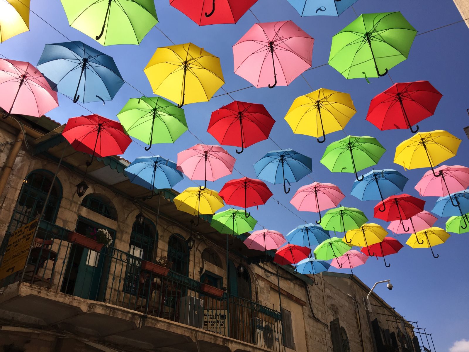 The Umbrellas Street Project is adorning Yoel Moshe Solomon Street in the h...