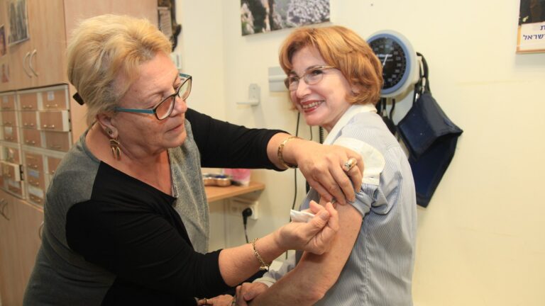 Former Israeli Minister of Health Yael German getting a flu shot last year. Photo by Isaac Harari/FLASH90