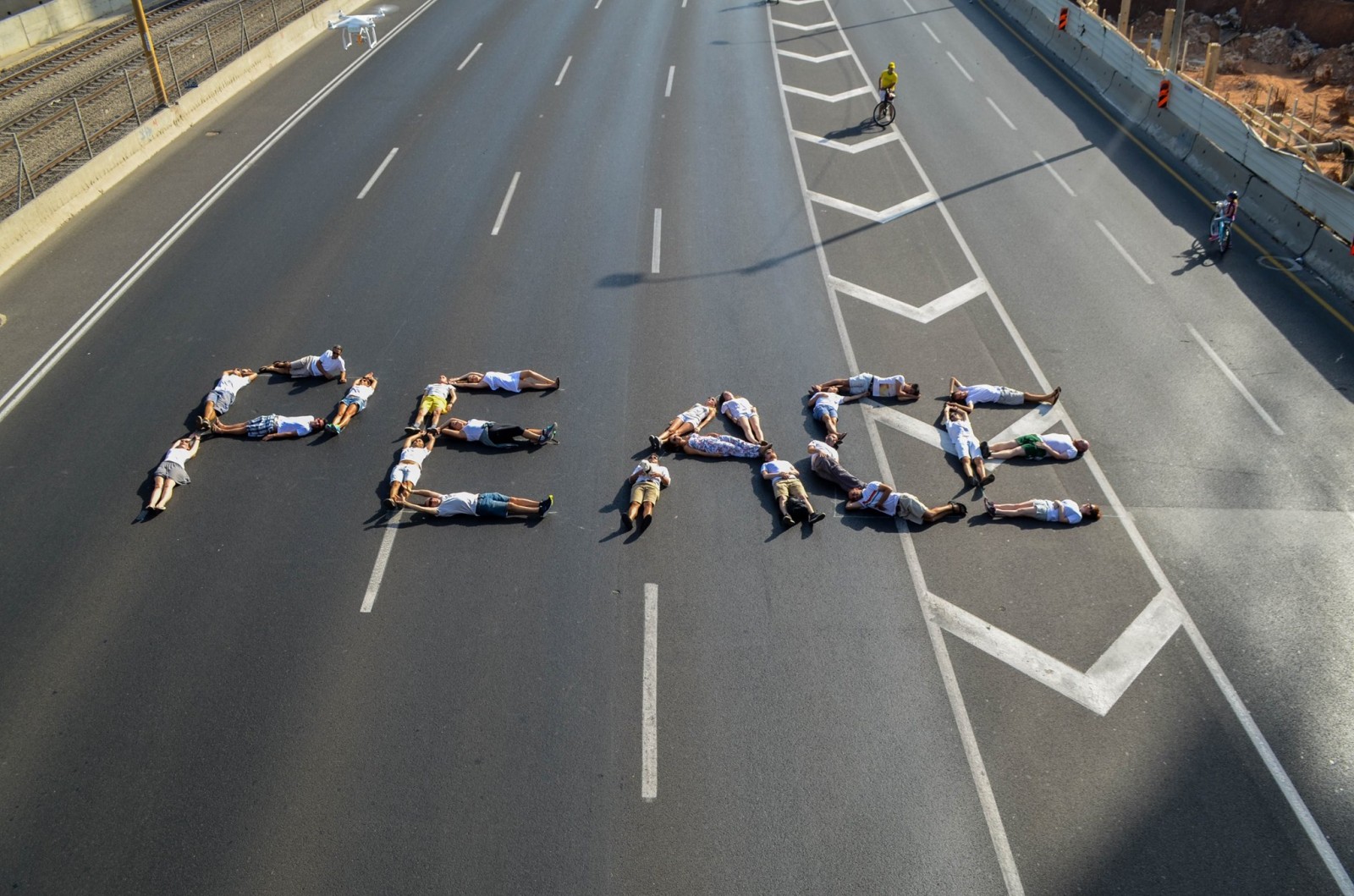 Joy Records and friends took to the quiet roads to send a message of peace. Photo Credit: Shlomi Levi 