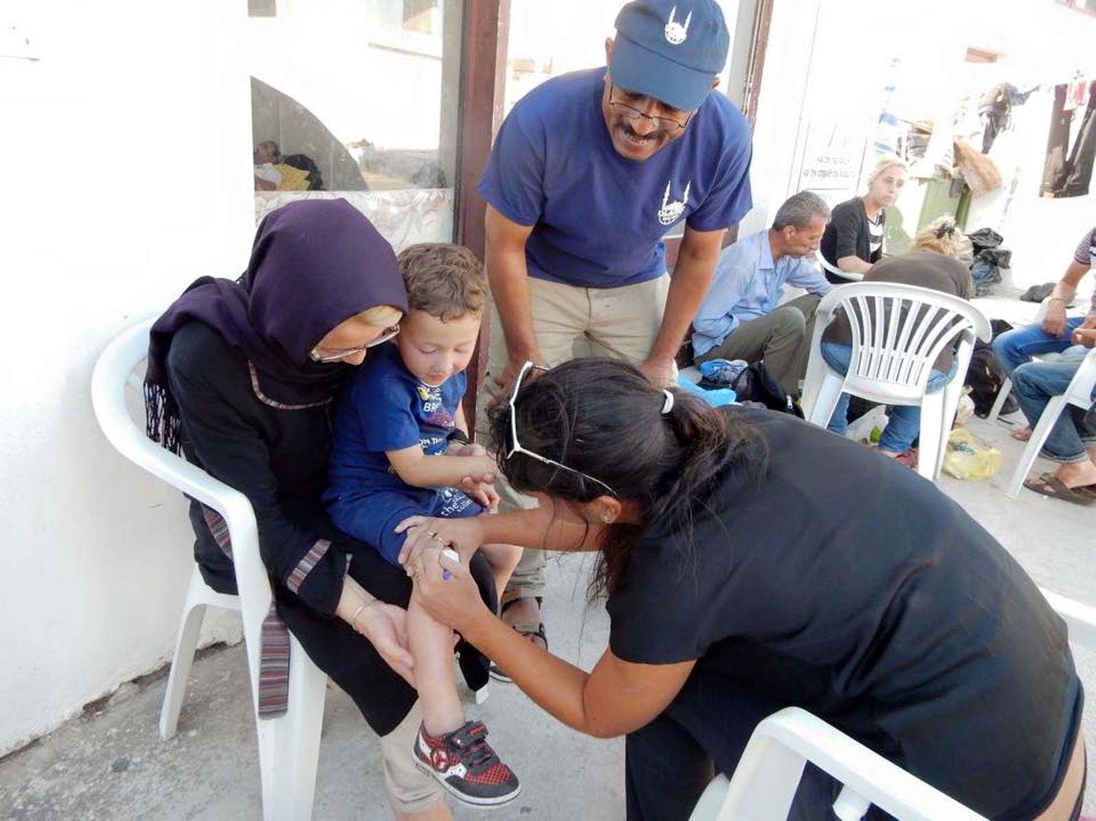 An IsraAID volunteer providing first aid in Greece. Photo via Facebook