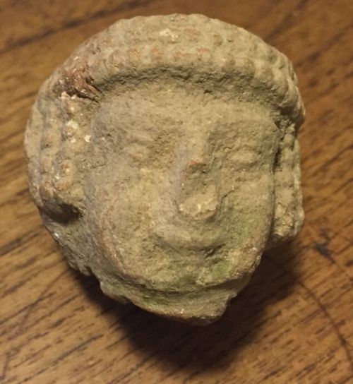 The head of the Iron Age statuette found by an eight-year-old Israeli boy. Photo by Alexander Glick/Israel Antiquities Authority)