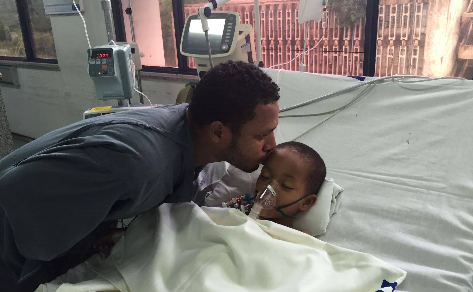 Kaifu's father, Abraham, seeing him for the first time post-surgery. Photo courtesy of SACH