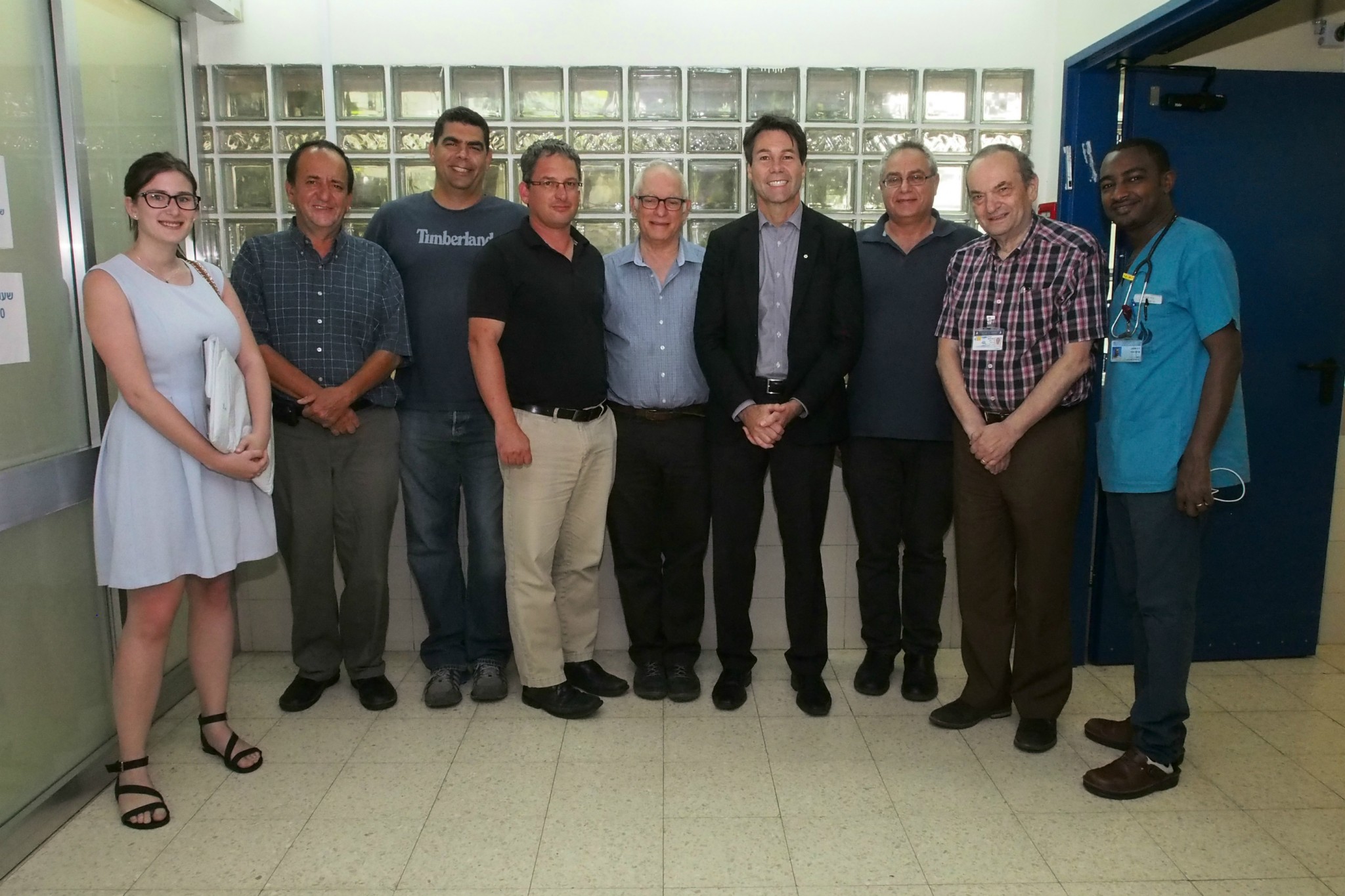 From left, Jessi Birenbaum from SACH Canada, Wolfson PICU director Dr. Sion Houri, adult and pediatric cardiac surgeon Dr. Hagi Dekel, SACH Executive Director Simon Fisher, Wolfson chief of pediatric cardiology Dr. Akiva Tamir, Ontario Health Minister Dr. Eric Hoskins, SACH lead surgeon and chief of cardiothoracic surgery Dr. Lior Sasson, Wolfson Director Dr. Yitzhak Berlovich, and Ethiopian surgeon in training Dr. Yayu Mekonnen. Photo by Sheila Shalhevet