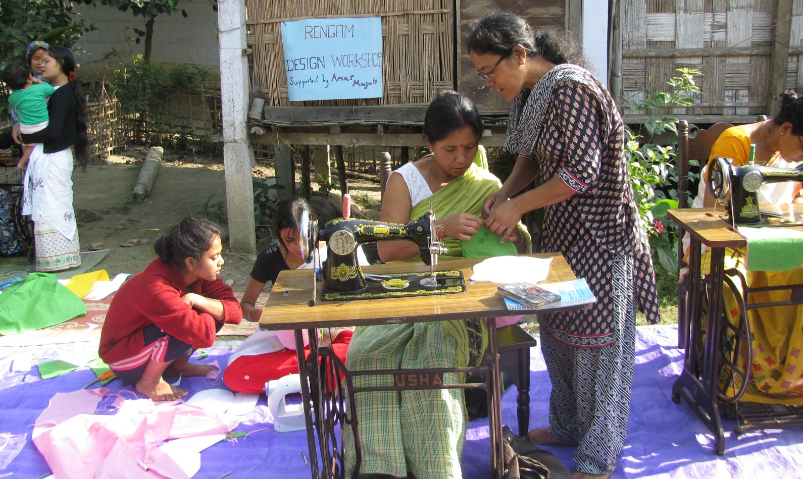 Women working on projects in the Rengam weaving cooperative. Photo courtesy of Gili Navon