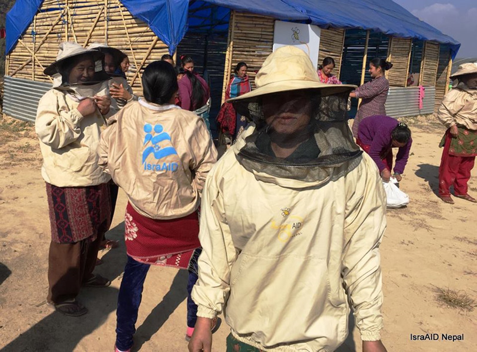 IsraAID’s HoneyAID project equips and trains Nepalese women to be beekeepers. Photo courtesy of IsraAID Nepal