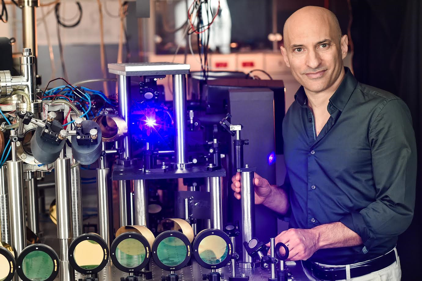 The blue light emanates from the location of the sonic black hole in Prof. Jeff Steinhauer’s Atomic Physics Lab at the Technion-Israel Institute of Technology. Photo: courtesy