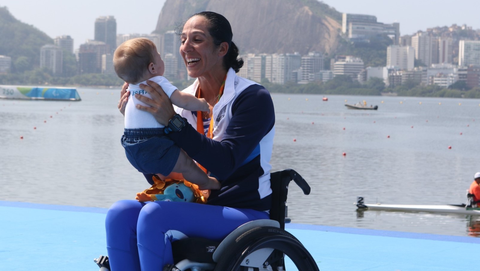 Moran Samuel's partner and son were there to see her big moment in Rio. The baby's name is Arad, Hebrew for "bronze." Photo by Keren Isaacson/Israel Olympic Committee